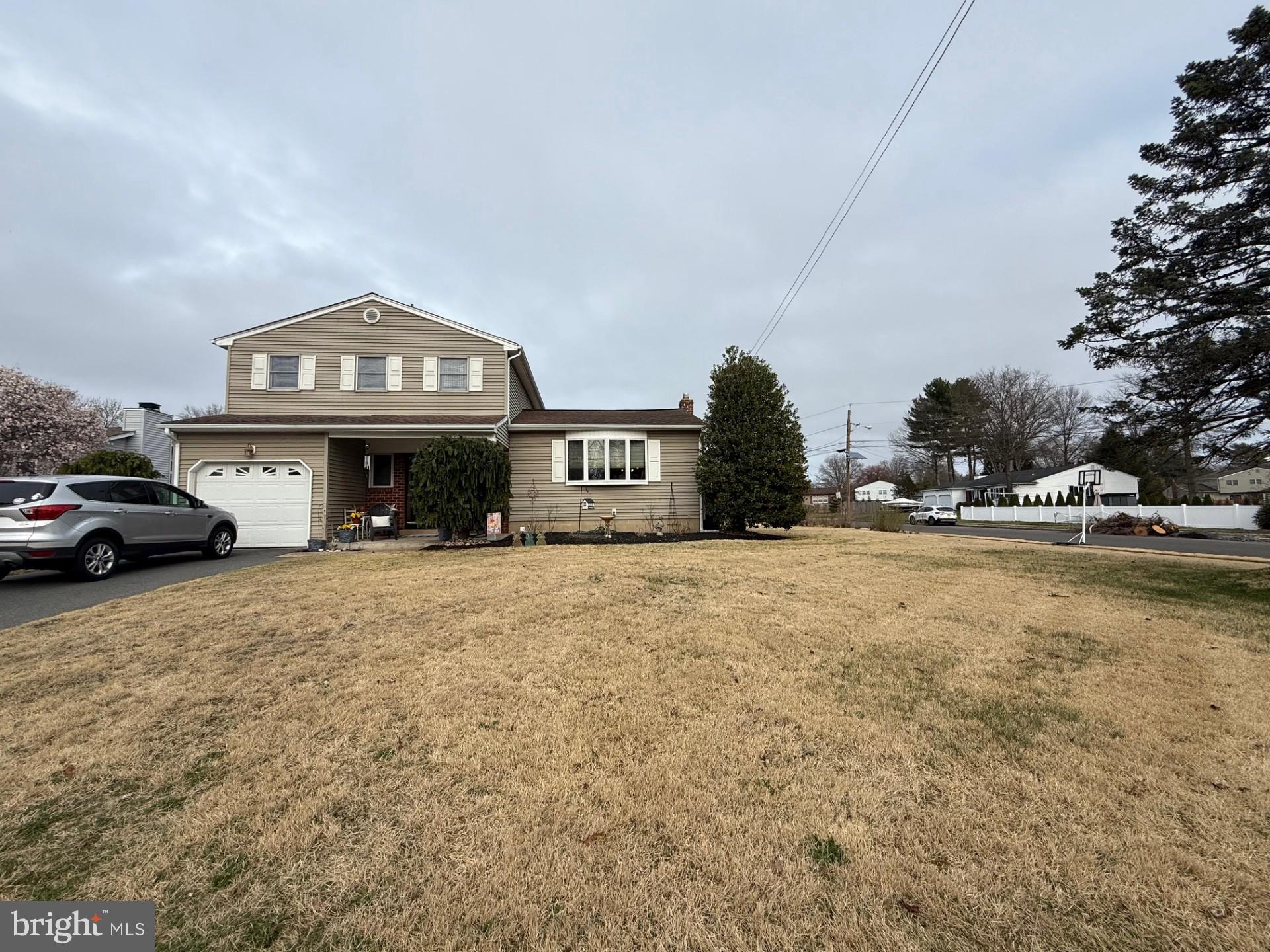 18 Wolfpack Road Hamilton, NJ 08619 - Photo 1 of 21 a front view of a building with parking space
