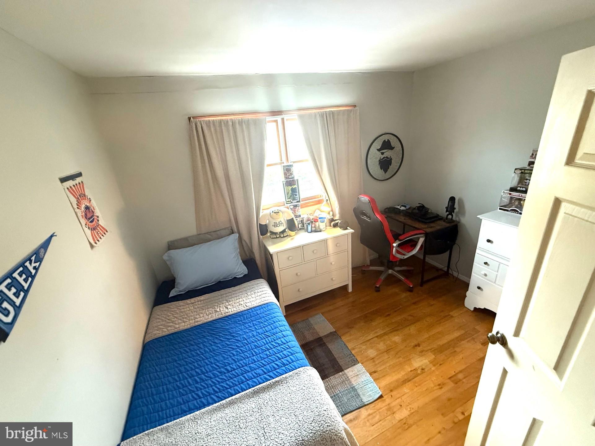 18 Wolfpack Road Hamilton, NJ 08619 - Photo 17 of 21 a bedroom with a bed and a window