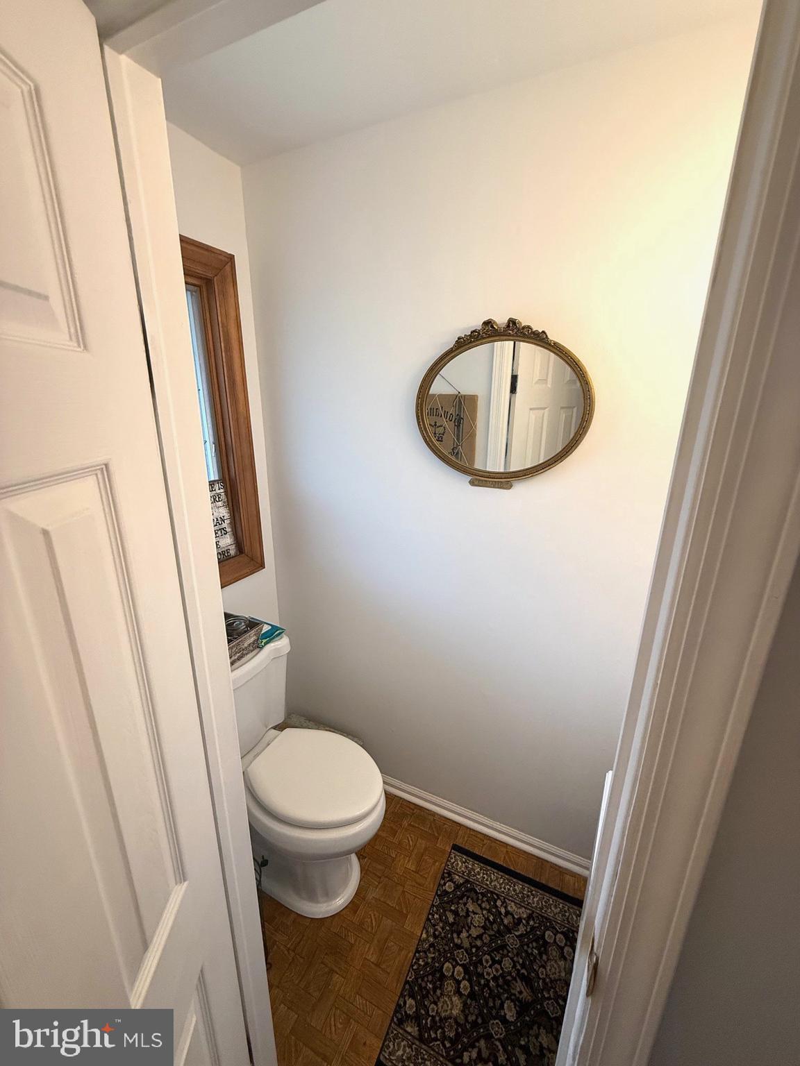 18 Wolfpack Road Hamilton, NJ 08619 - Photo 18 of 21 a bathroom with a toilet and a mirror