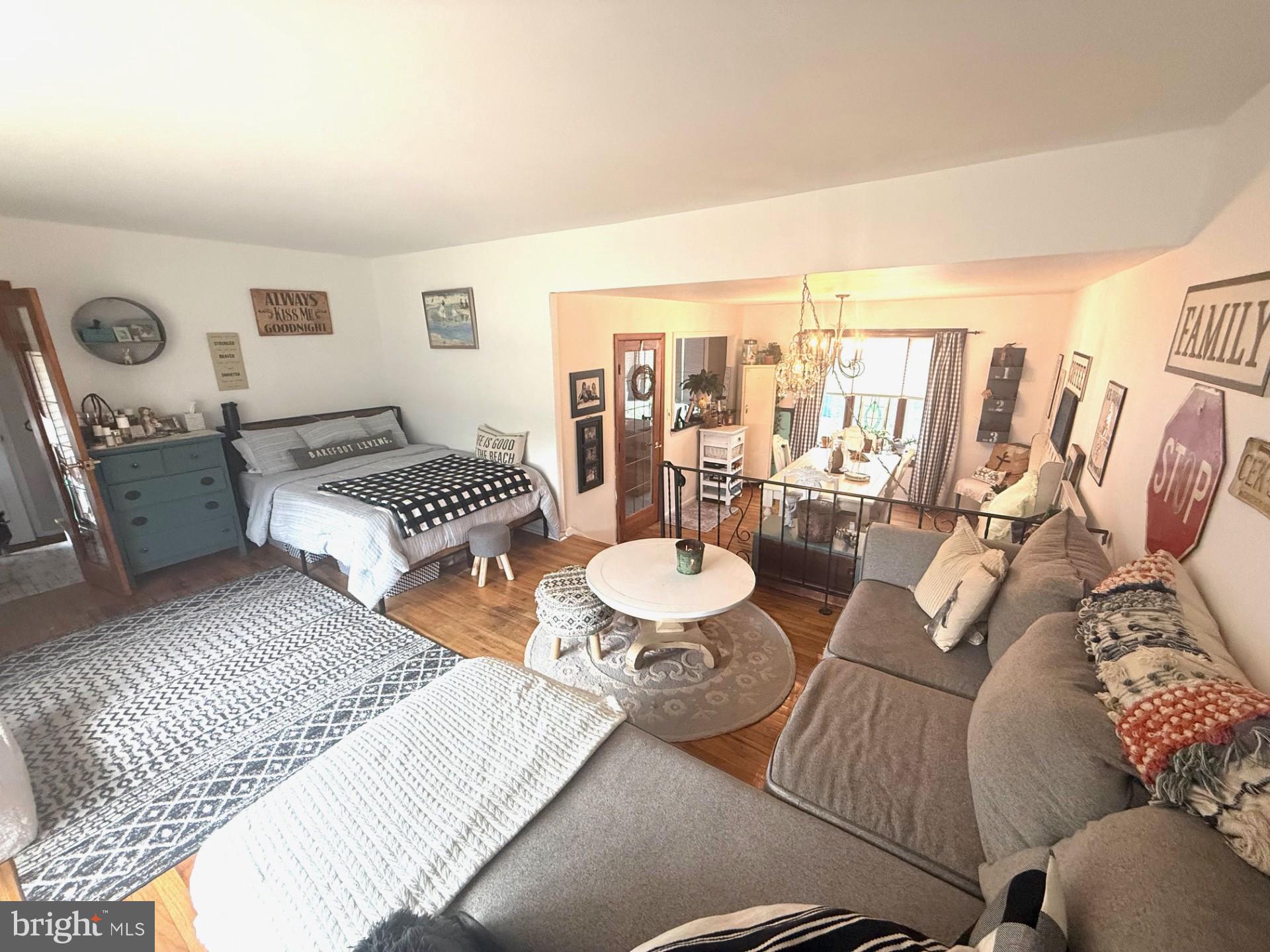 18 Wolfpack Road Hamilton, NJ 08619 - Photo 2 of 21 a living room with furniture and wooden floor