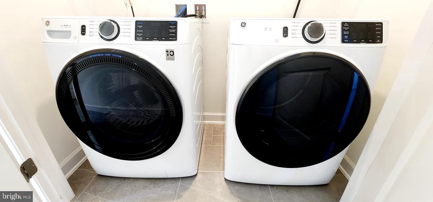 5053 Bigleaf Road Fredericksburg, VA 22407 - Photo 14 of 21 Modern laundry duo in sleek design.
