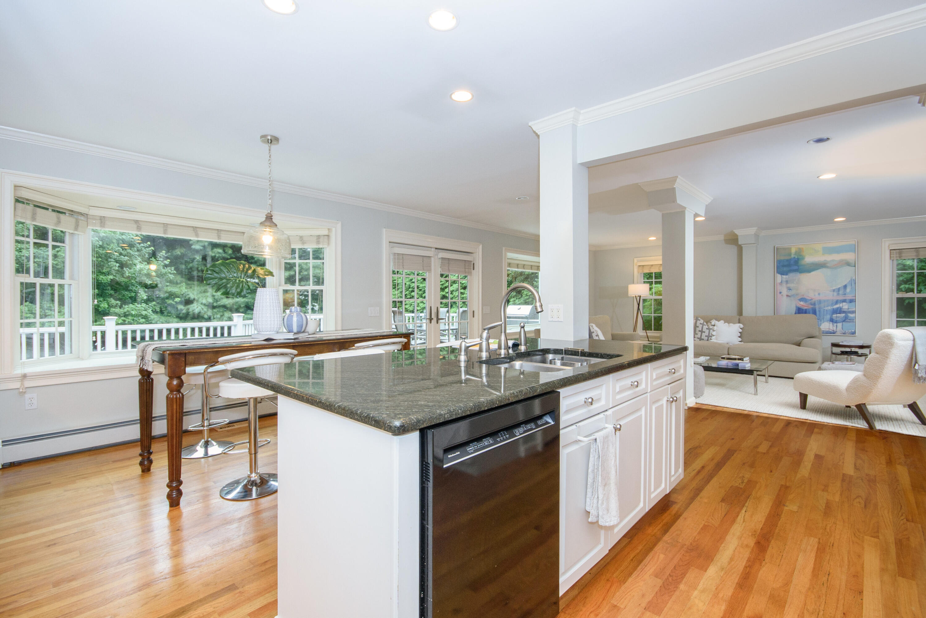 2 Red Barn Road Darien, CT 06820 - Photo 12 of 36 a kitchen with sink stove and wooden floor