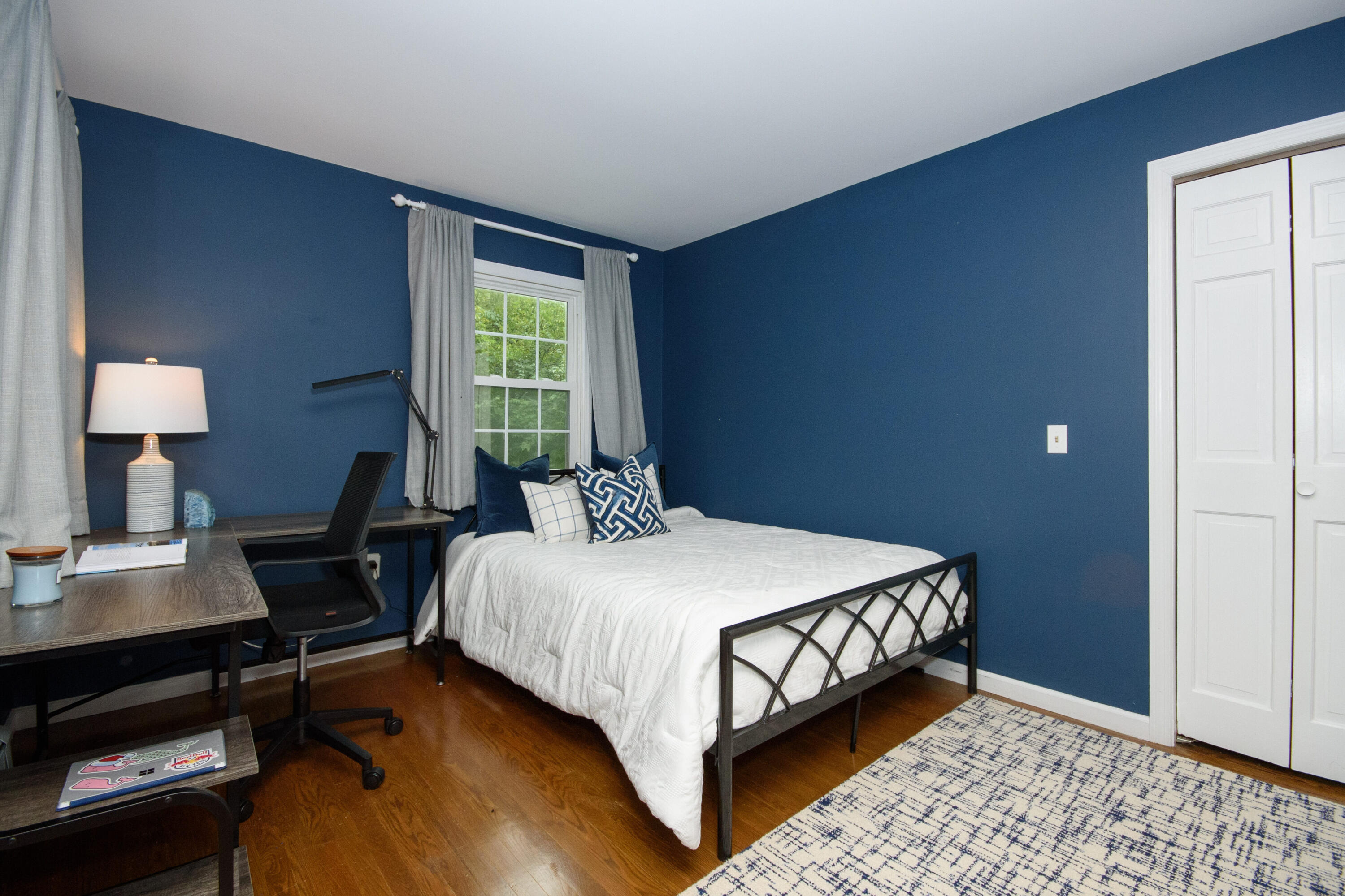 2 Red Barn Road Darien, CT 06820 - Photo 19 of 36 a bedroom with a bed and a window