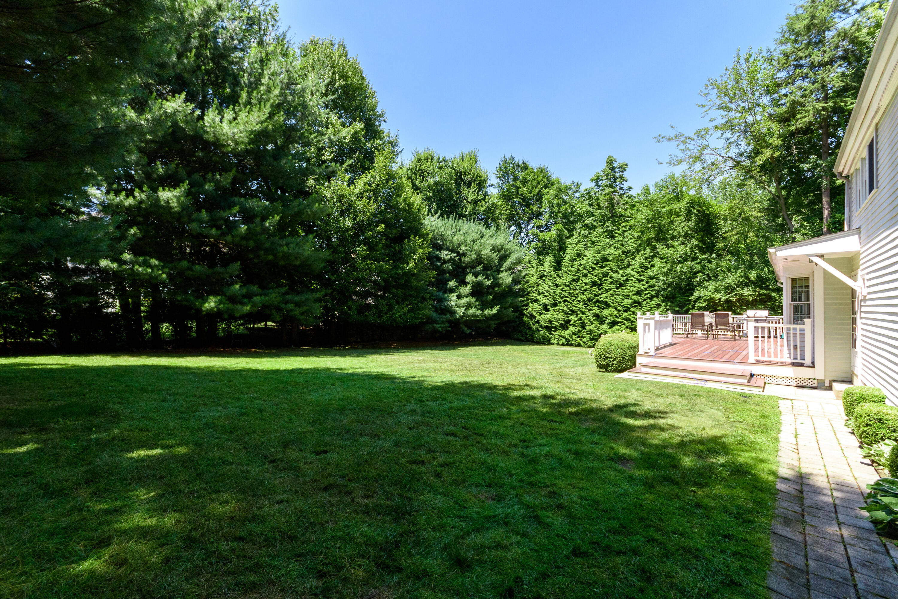 2 Red Barn Road Darien, CT 06820 - Photo 30 of 36 a view of a chair and table of the garden