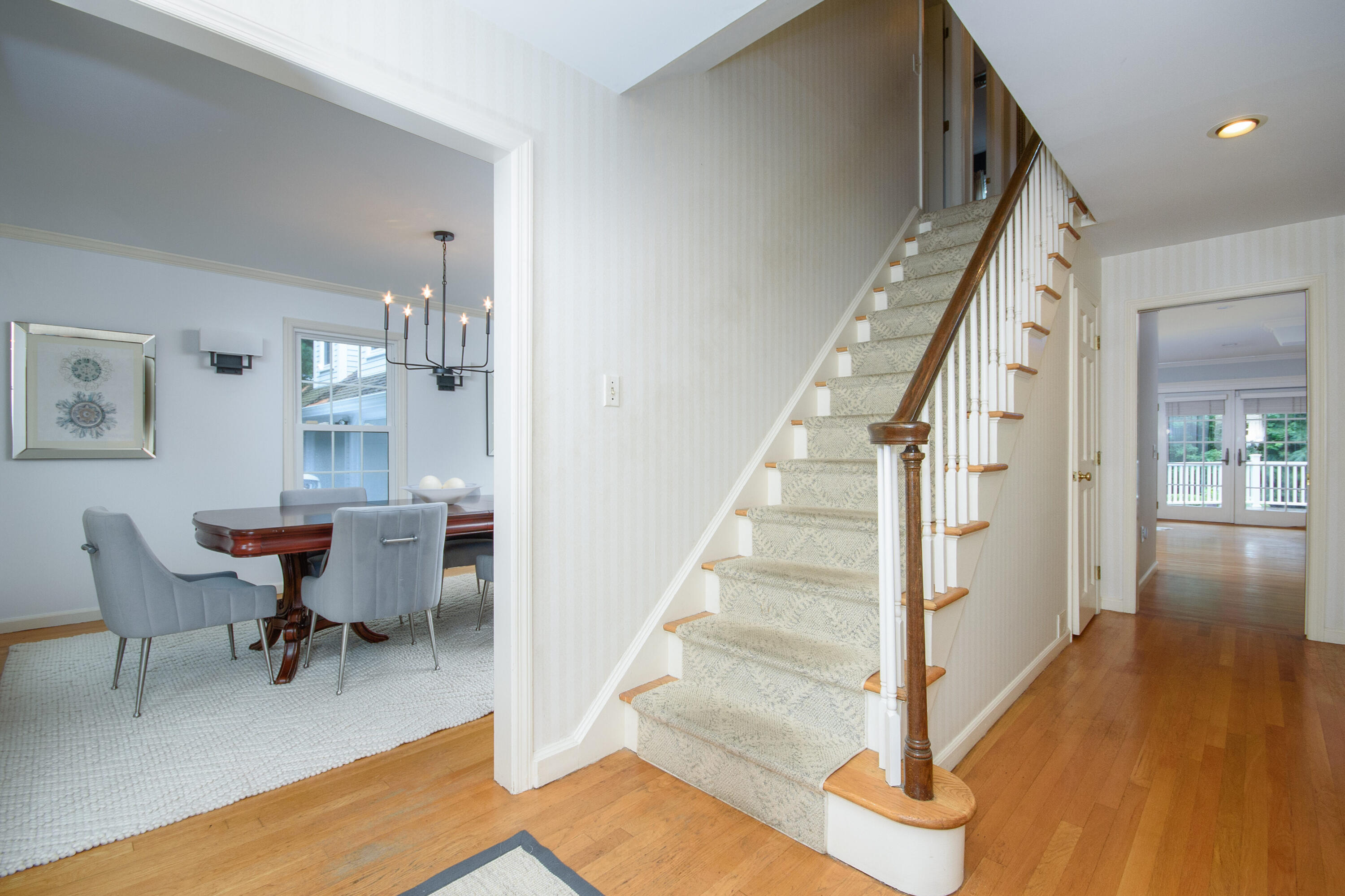 2 Red Barn Road Darien, CT 06820 - Photo 3 of 36 a view of a livingroom with furniture and wooden floor