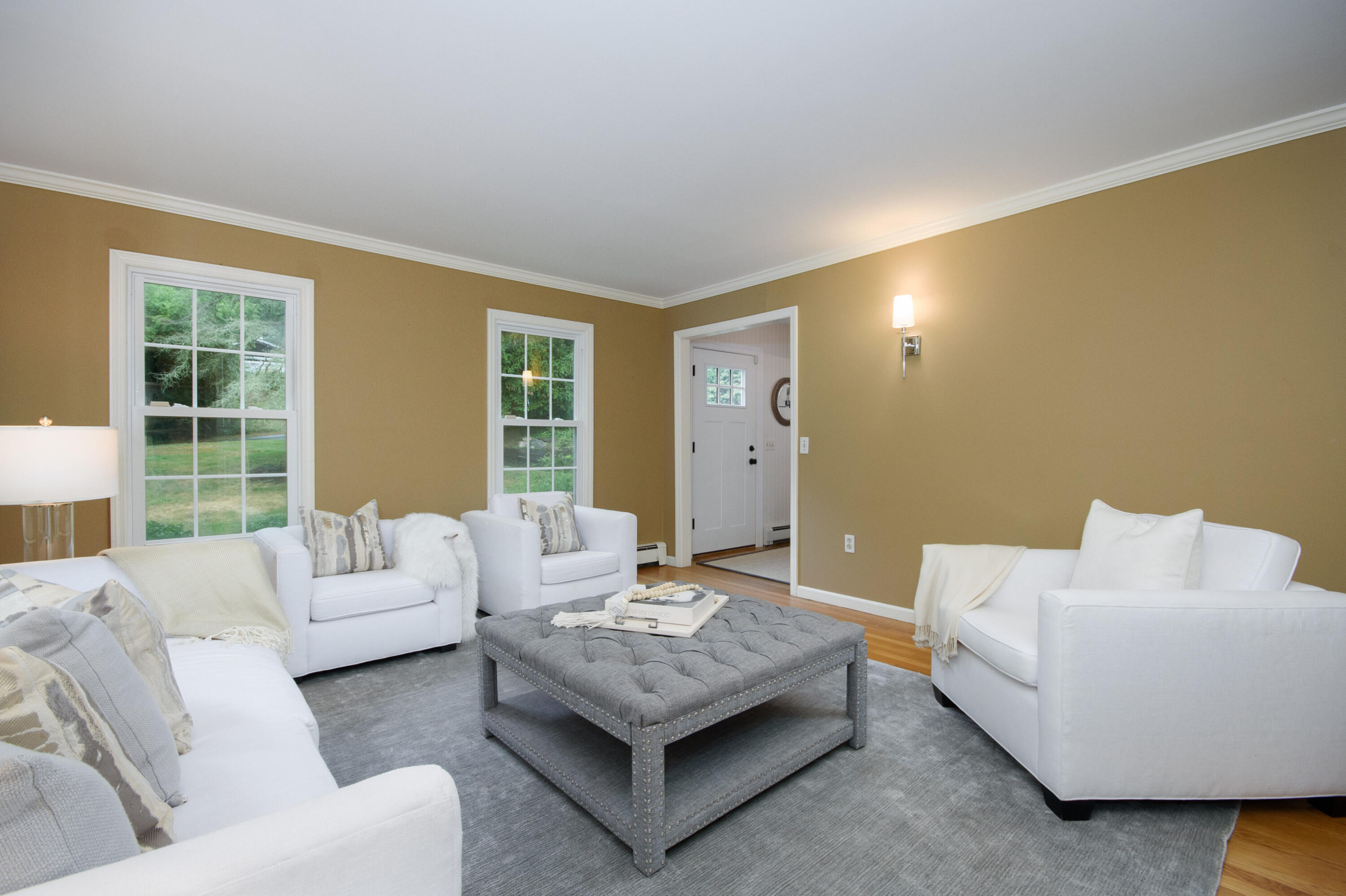2 Red Barn Road Darien, CT 06820 - Photo 5 of 36 a living room with furniture and a large window