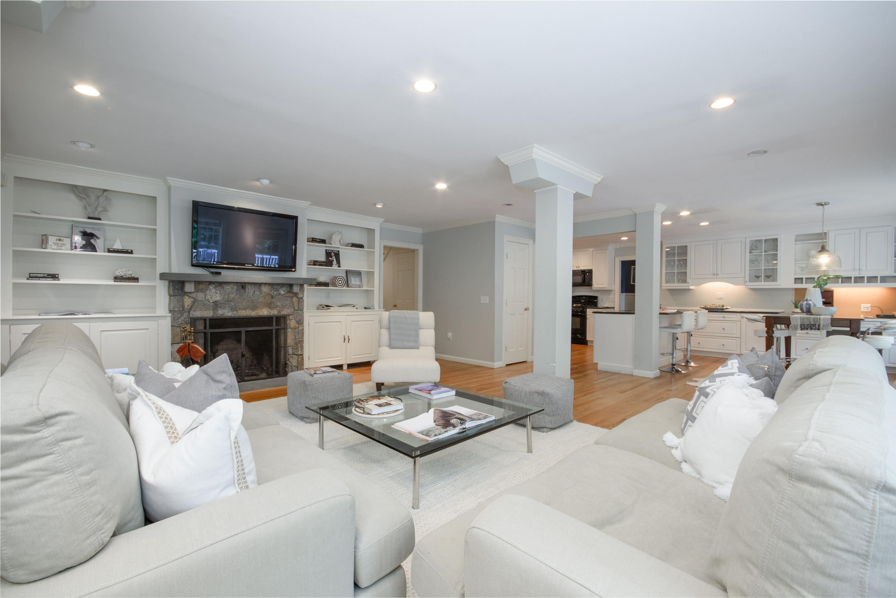 2 Red Barn Road Darien, CT 06820 - Photo 8 of 36 a living room with furniture and a fireplace
