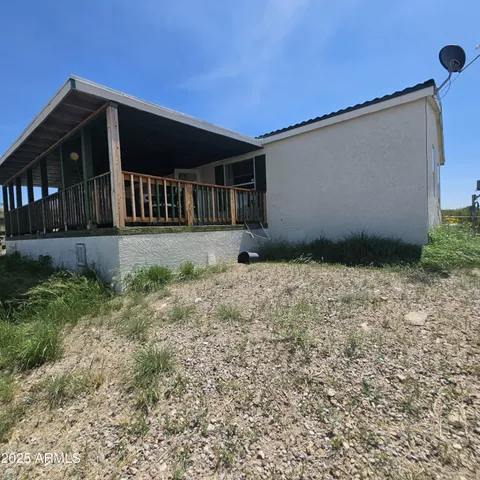 a view of backyard of house