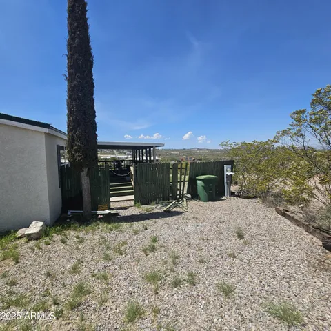 a view of a yard with an ocean beach