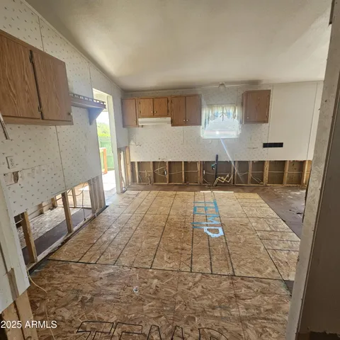 a living room with a rug