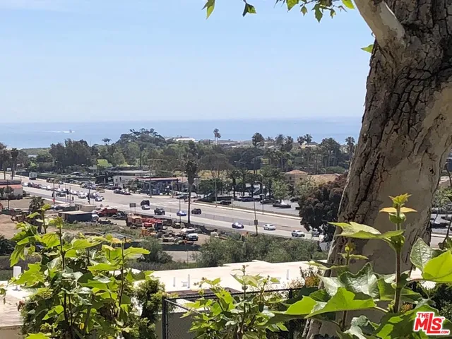 a view of a kitchen with a sink
