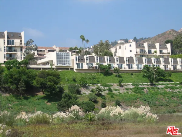 a view of a city that has tall buildings