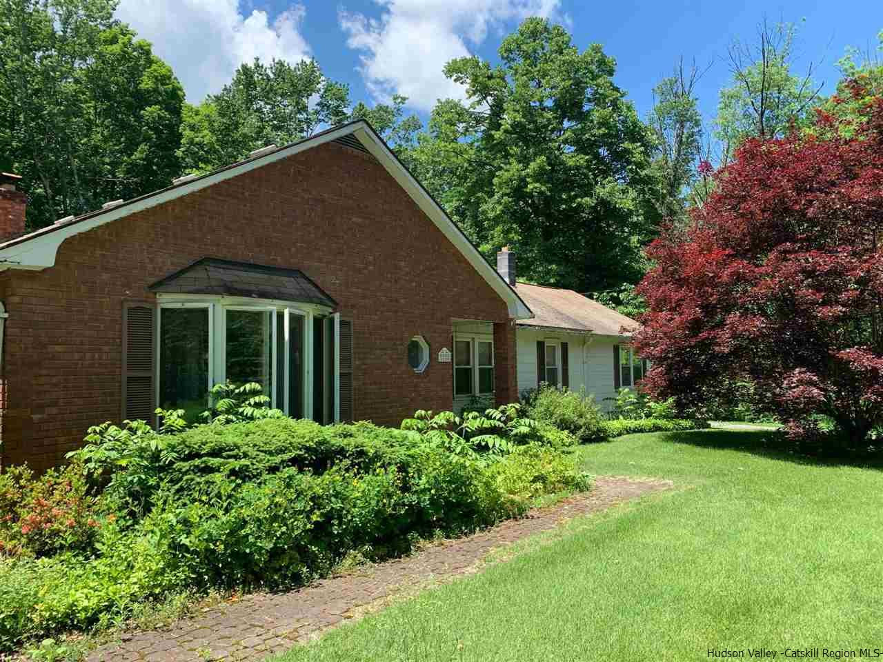 a view of a house with garden