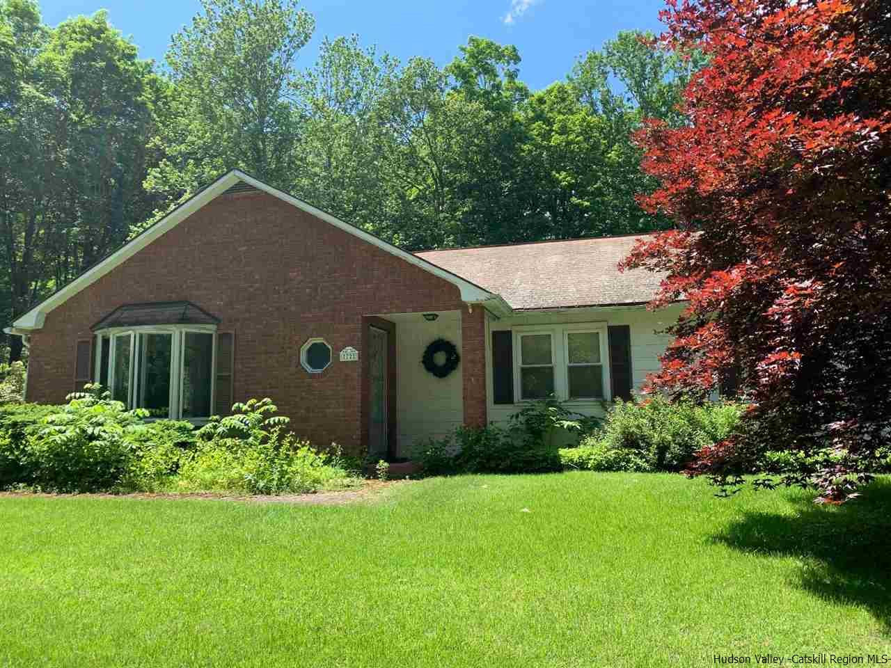 72 Union Center Road Ulster Park, NY 12487 - Photo 2 of 11 a front view of house with yard and green space