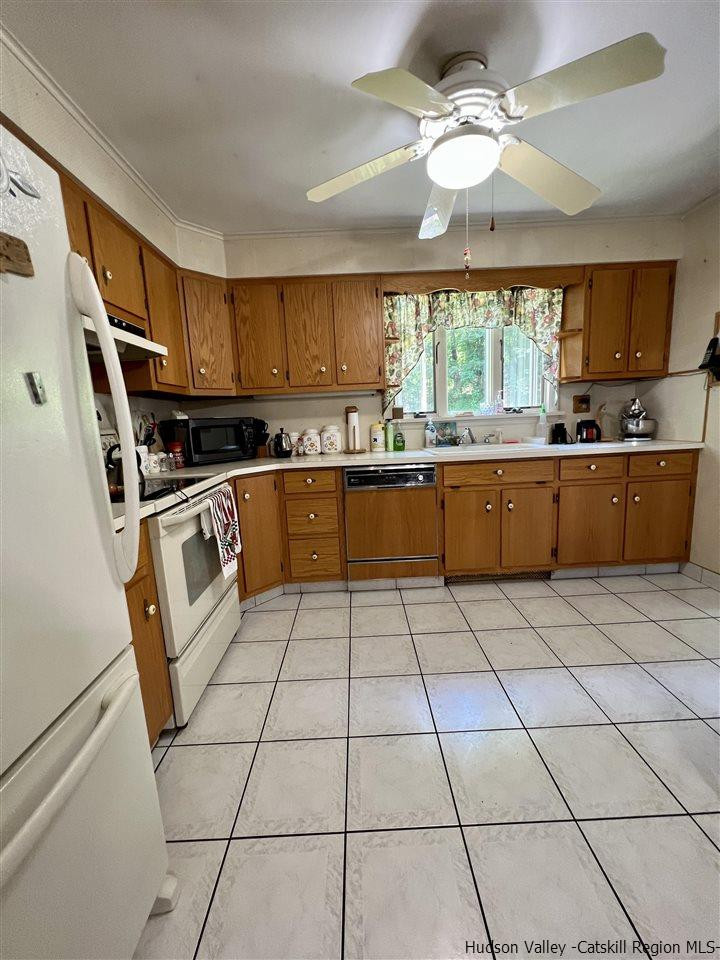 72 Union Center Road Ulster Park, NY 12487 - Photo 3 of 11 a kitchen with stainless steel appliances granite countertop a stove a sink dishwasher and a refrigerator