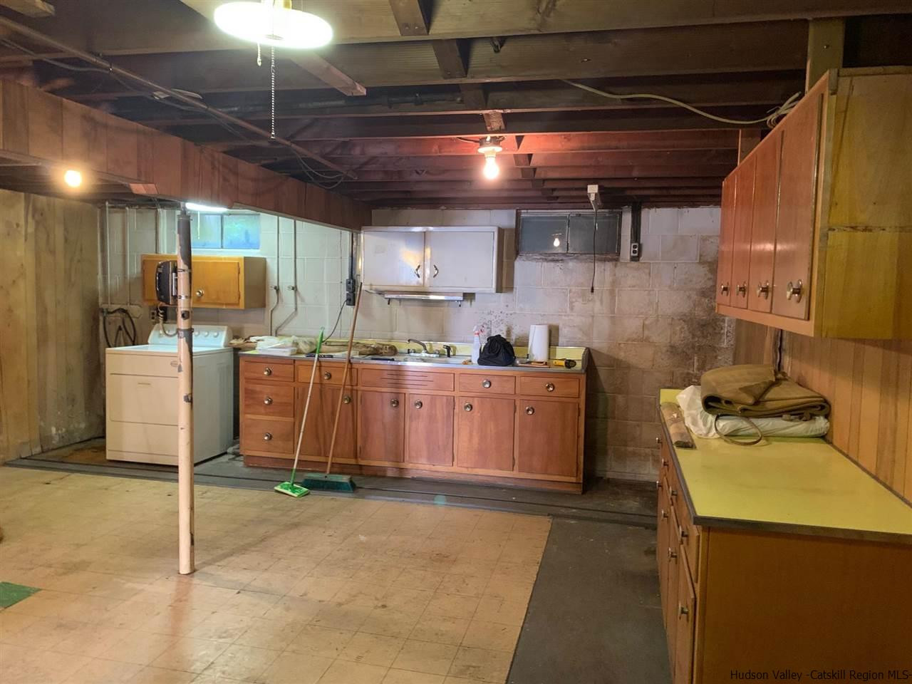 72 Union Center Road Ulster Park, NY 12487 - Photo 8 of 11 a storage room with washer and dryer