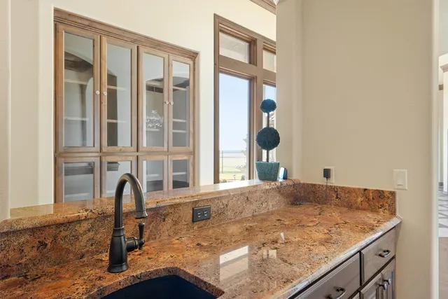 a view of a kitchen area of a house