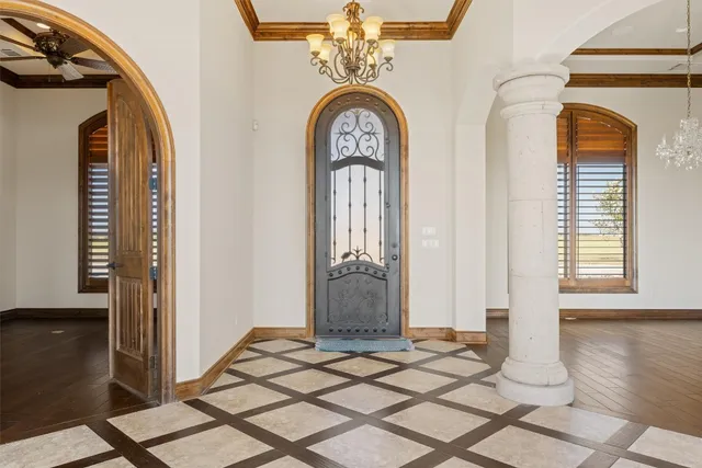 a view of entryway with wooden floor