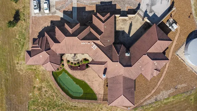 an aerial view of a highlighted house