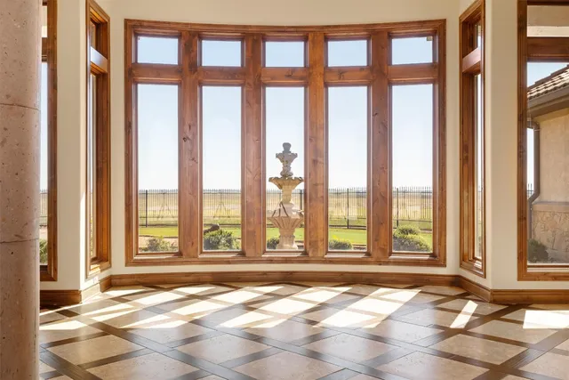 a view of an empty room and window