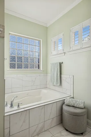a bathroom with sink and bathtub
