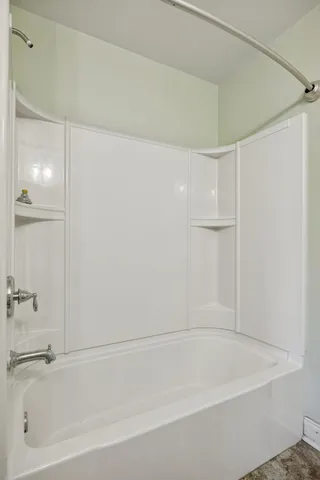 a bathroom with a bathtub