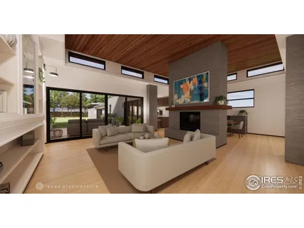 a living room with furniture a large window and a fireplace