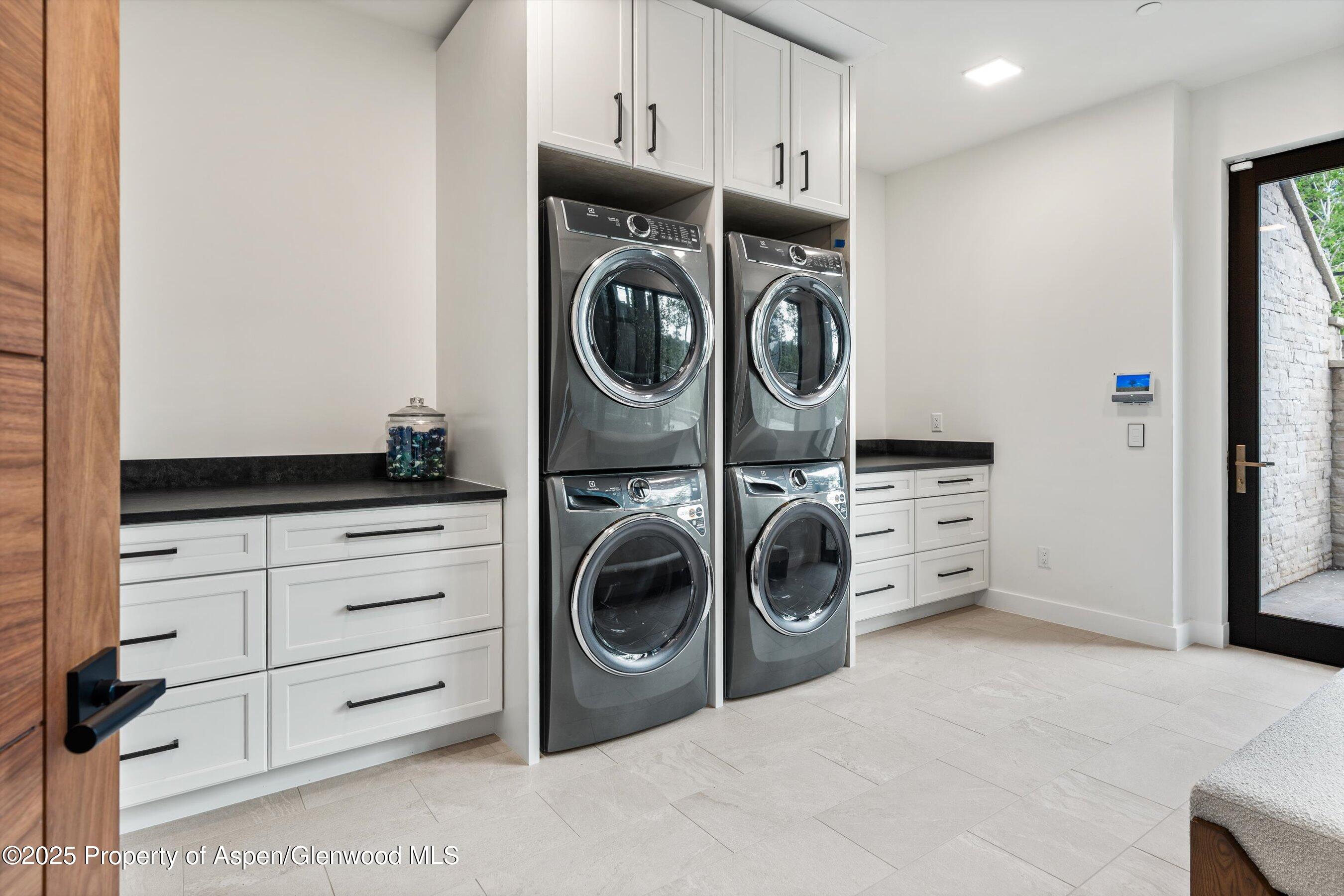 1234 Wood Road Snowmass Village, CO 81615 - Photo 57 of 66 a utility room with dryer and washer