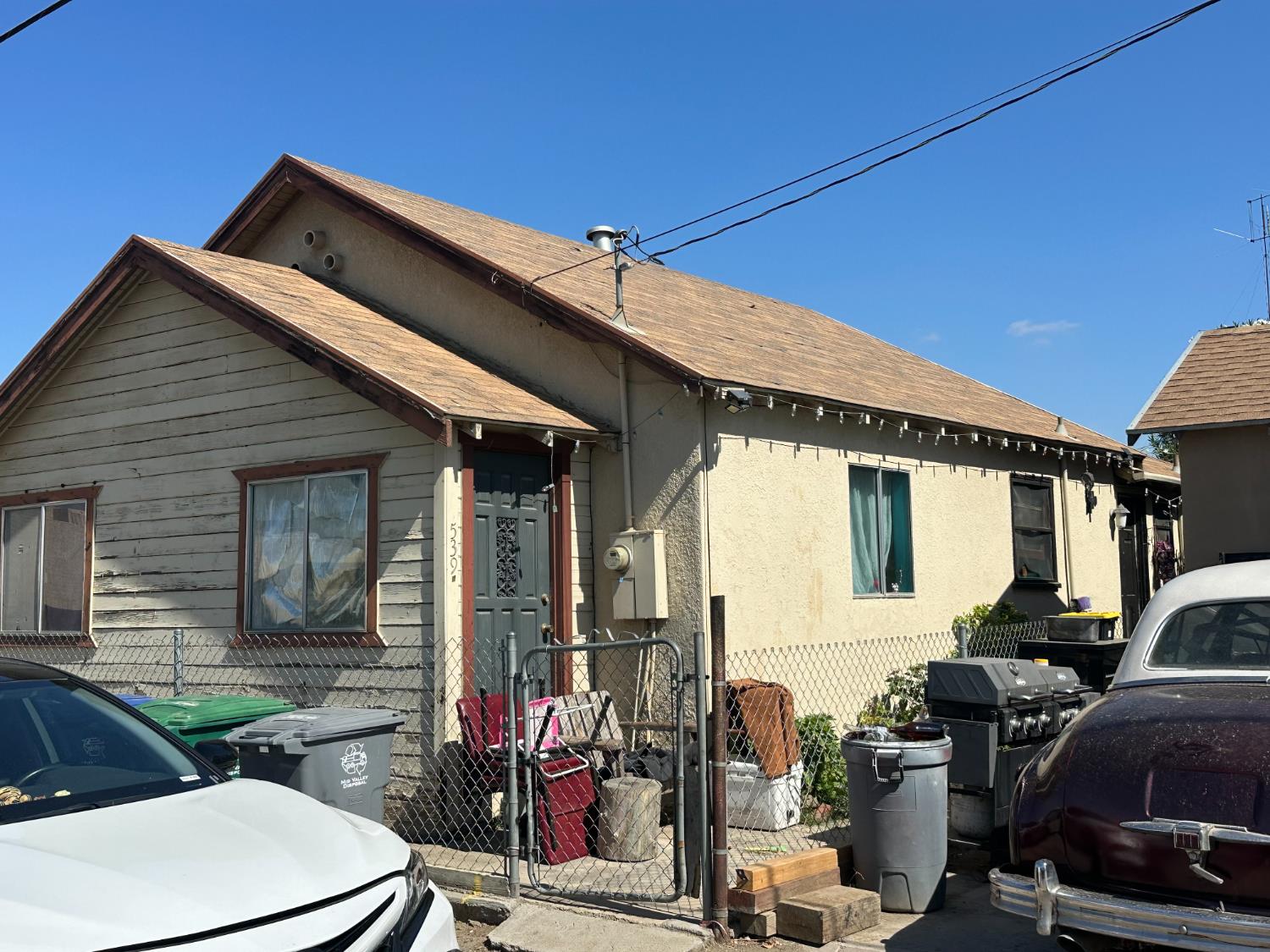 539 4th Street Gustine, CA 95322 - Photo 5 of 5 a front view of a house with garage