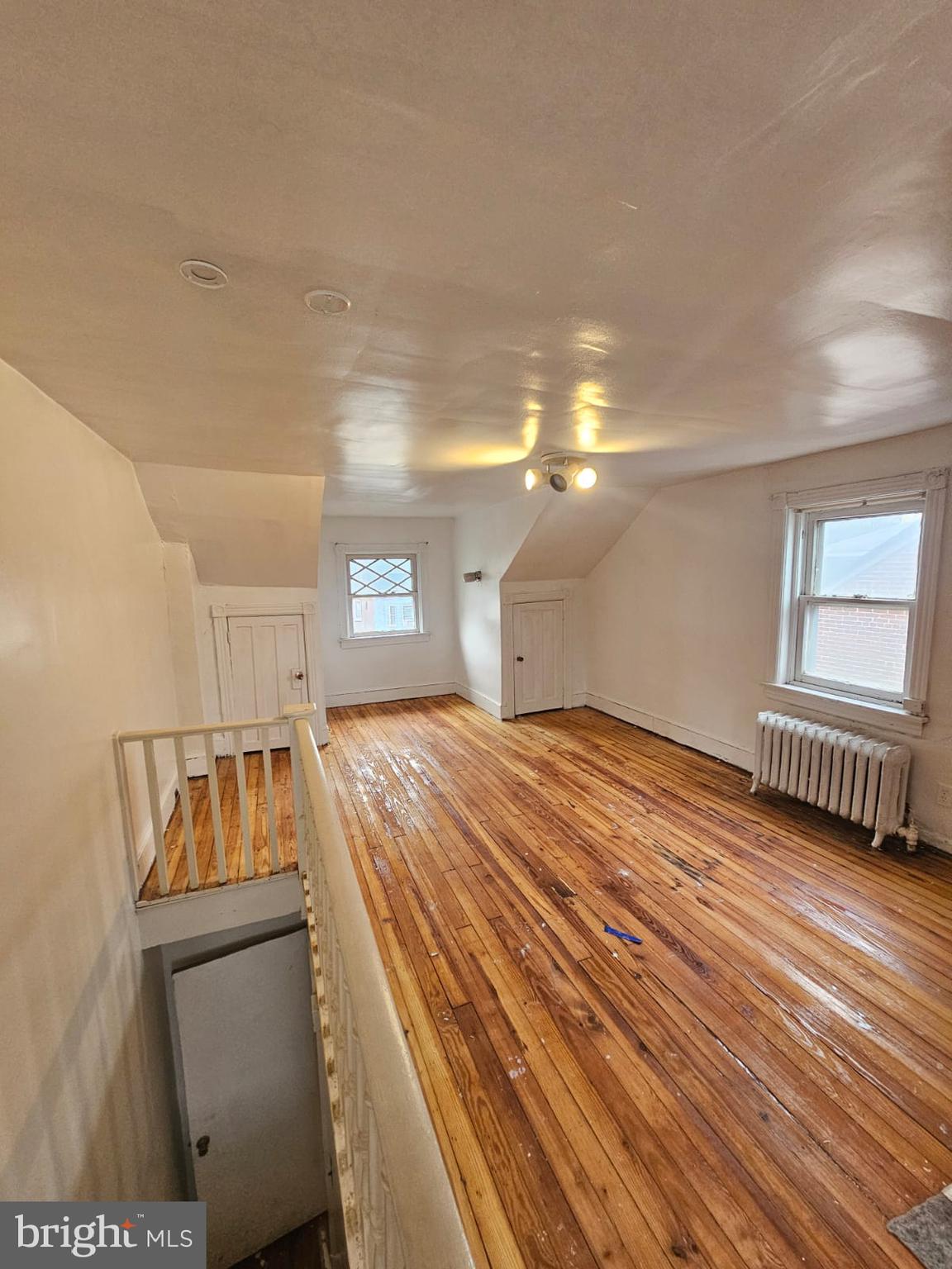 263 Highland Avenue Trenton, NJ 08618 - Photo 6 of 8 a view of an empty room and window