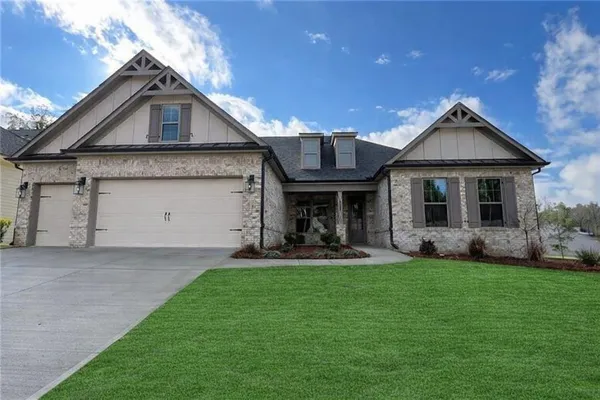 front view of a house with a yard