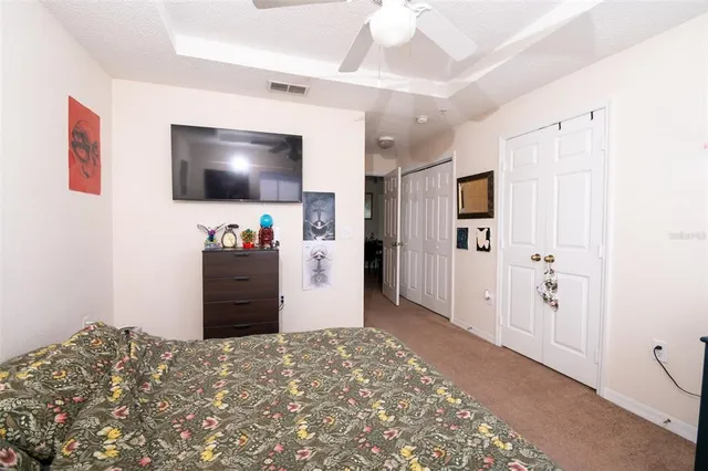 a view of living room with furniture and wooden floor