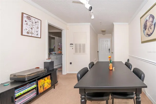 a view of a dining room with furniture