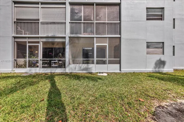 an aerial view of a tennis ground and a terrace