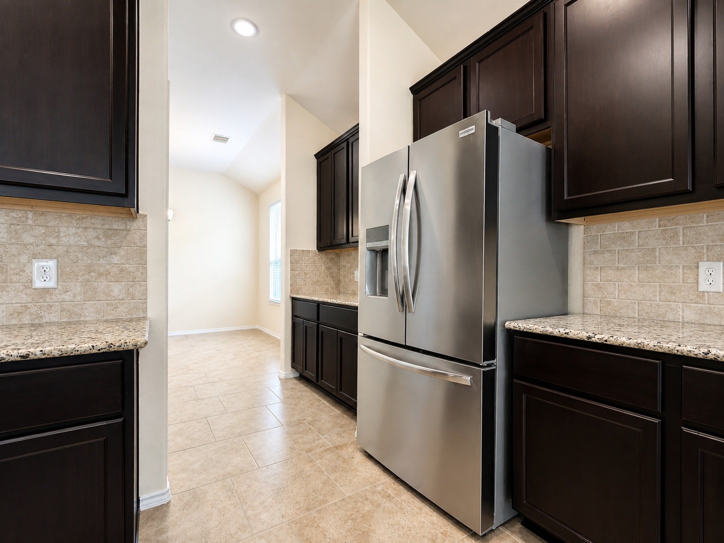 24315 Ravenna Landing Loop Spring, TX 77389 - Photo 14 of 37 a metallic refrigerator freezer sitting in a kitchen