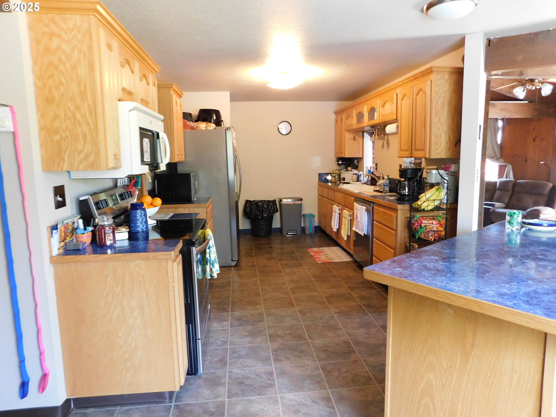 231 Northeast Darrell Avenue Winston, OR 97496 - Photo 12 of 47 a dining room filled with furniture and a window