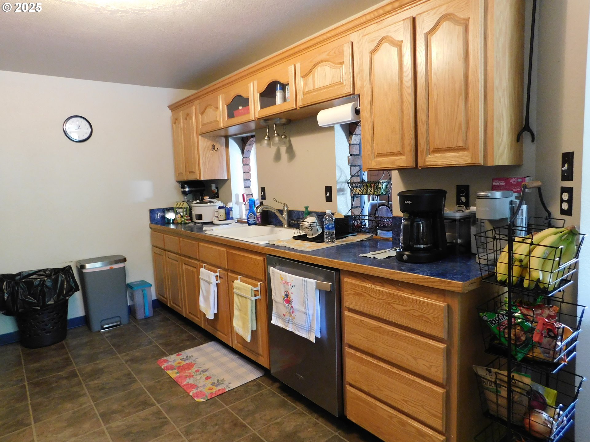 231 Northeast Darrell Avenue Winston, OR 97496 - Photo 14 of 47 a kitchen with stainless steel appliances granite countertop a sink a stove and a cabinets