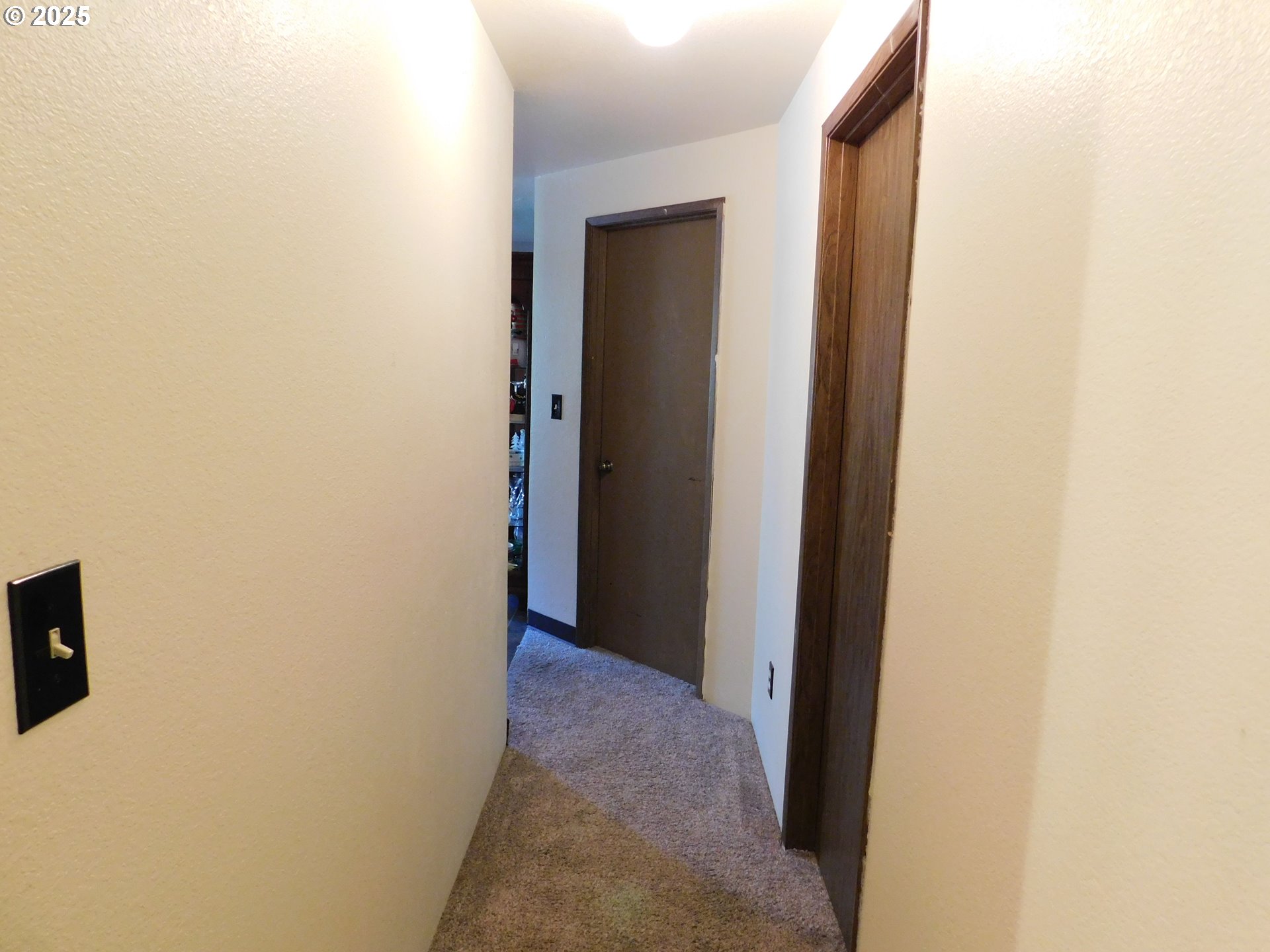 231 Northeast Darrell Avenue Winston, OR 97496 - Photo 20 of 47 a view of a hallway with closet