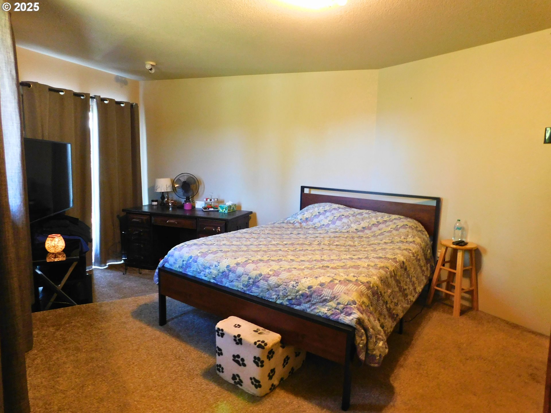 231 Northeast Darrell Avenue Winston, OR 97496 - Photo 22 of 47 a bedroom with a bed and wooden floor