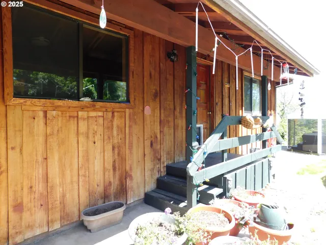 a view of balcony with furniture