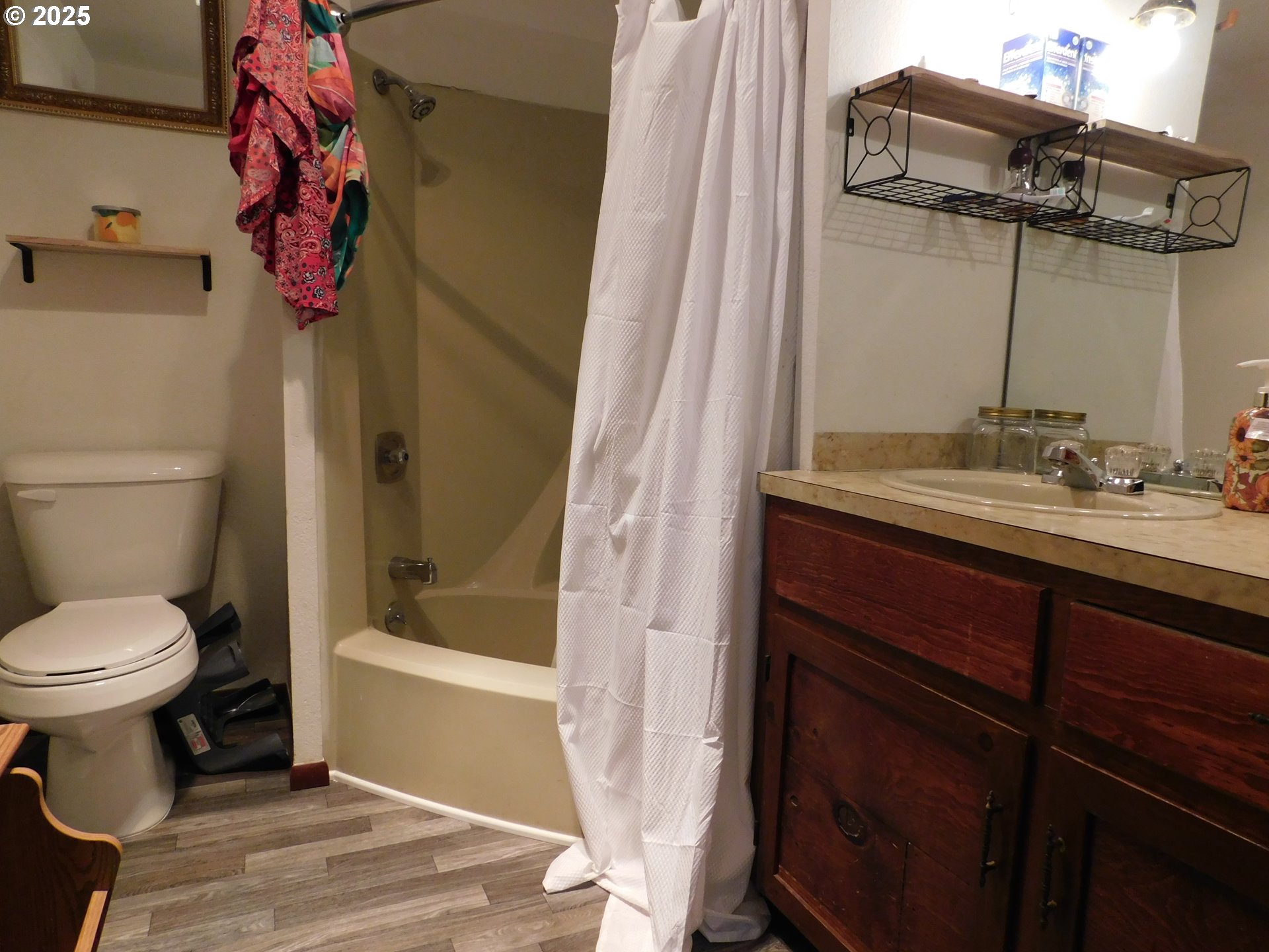 231 Northeast Darrell Avenue Winston, OR 97496 - Photo 32 of 47 a bathroom with a sink toilet and shower