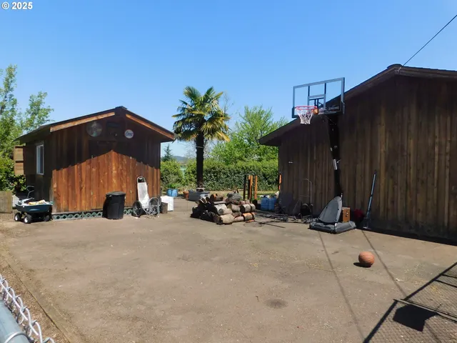 an outdoor space with furniture and a barbeque area