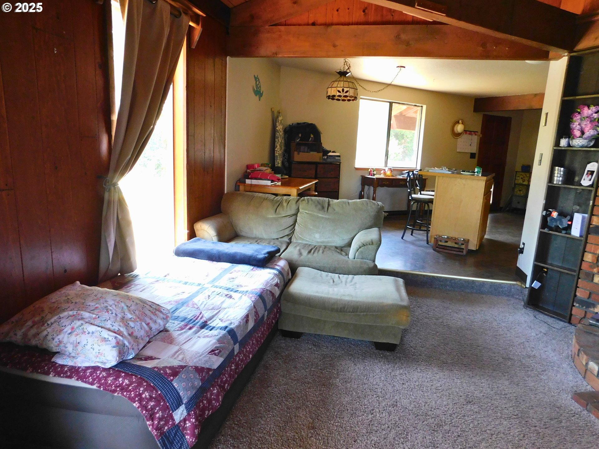 231 Northeast Darrell Avenue Winston, OR 97496 - Photo 10 of 47 a living room with furniture and a flat screen tv