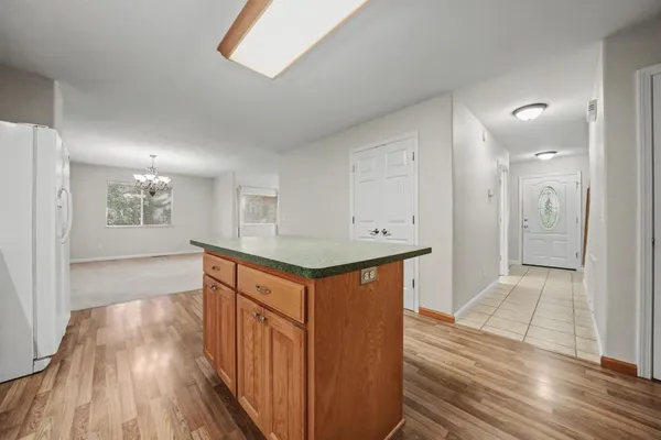 a view of kitchen with wooden floor
