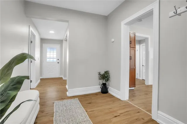 a living room with furniture and a rug