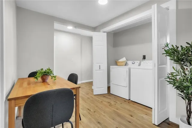 a workspace with furniture and wooden floor