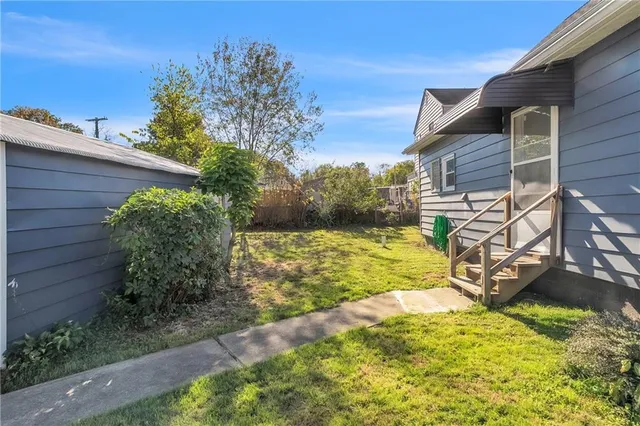 a view of a backyard with plants