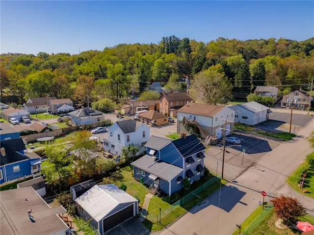 a view of a house with a garden