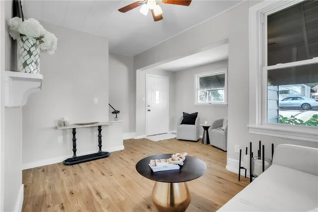 a living room with furniture and a window