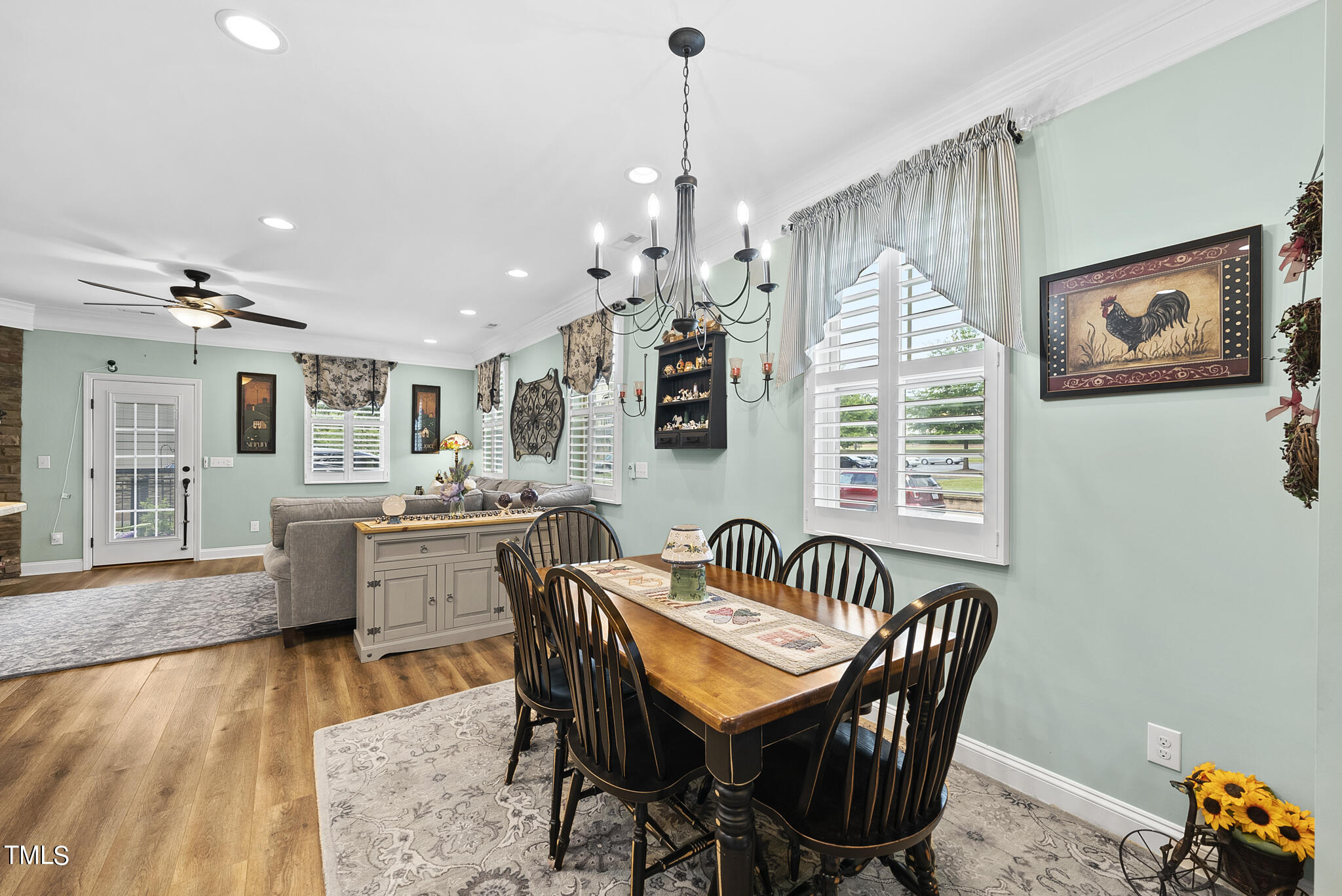 699 Wickham Ridge Road Apex, NC 27539 - Photo 16 of 36 a dining room with furniture and window